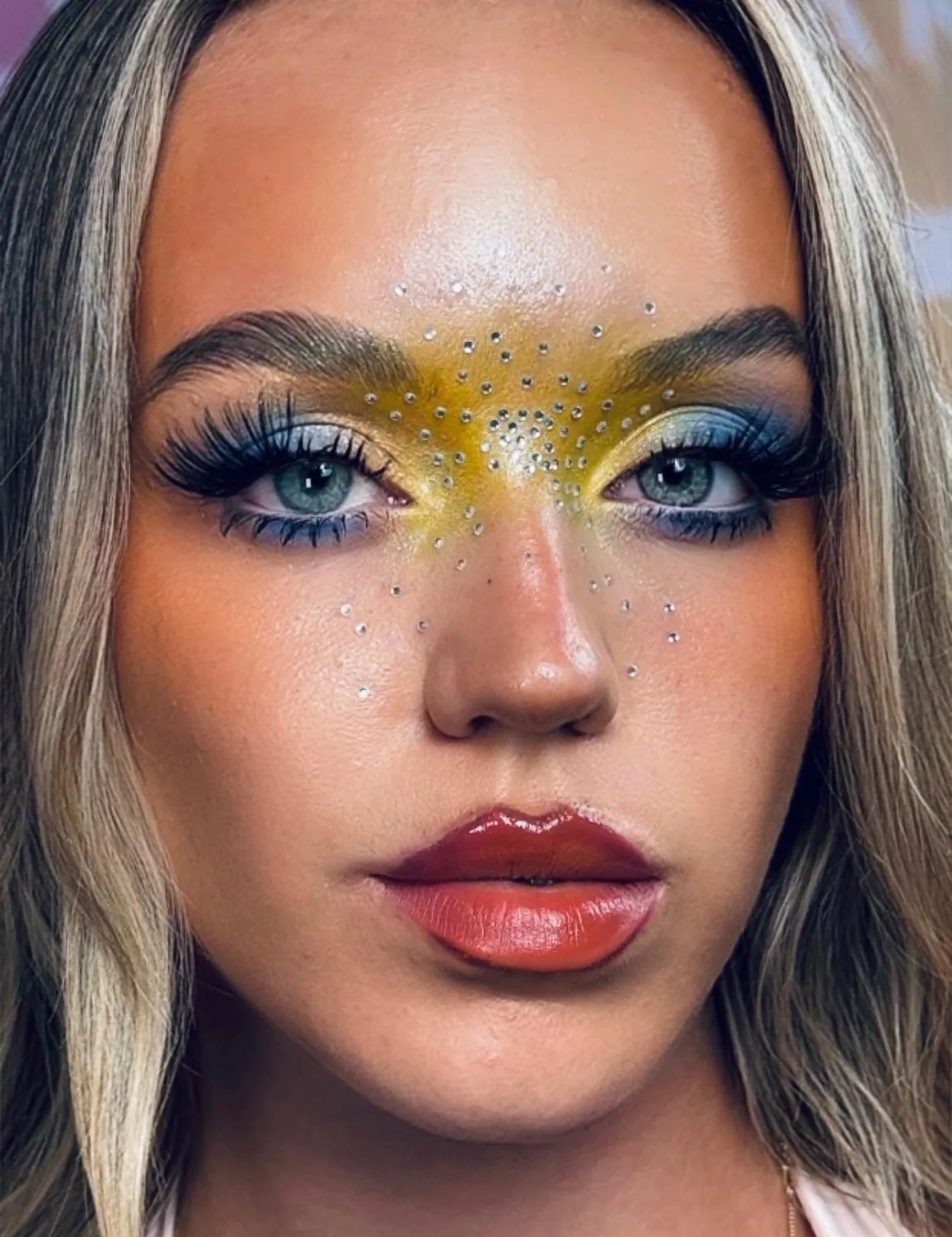 Close-up beauty portrait with gold eyeshadow